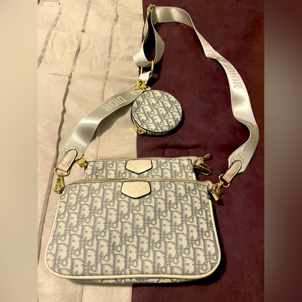 Cute crossbody bag with detachable/additional coin purse and wristlet.